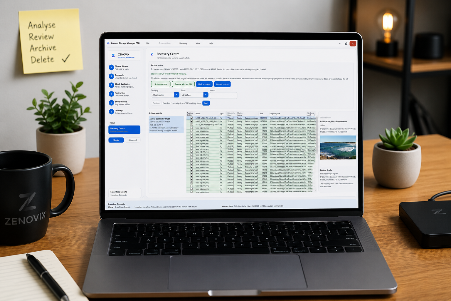 Zenovix Storage Manager Recovery Centre on a laptop beside a note listing analyse, review, archive and delete